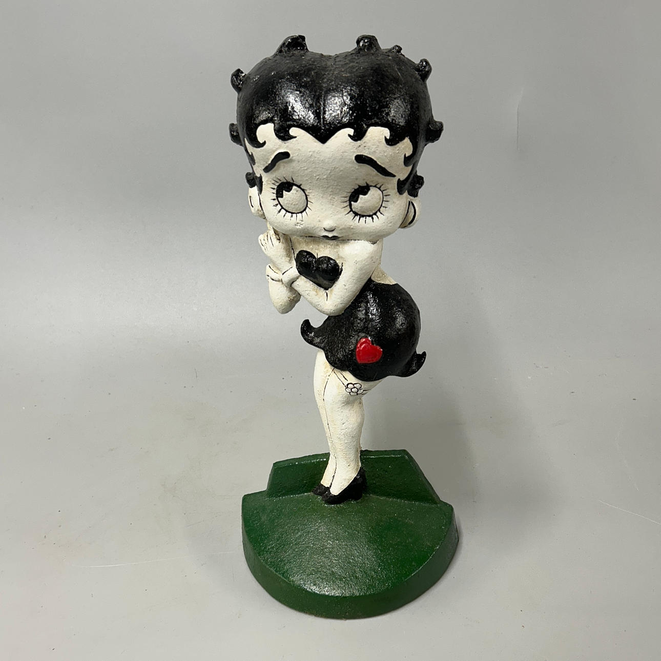 A CAST IRON BETTY BOOP DOOR STOP.
