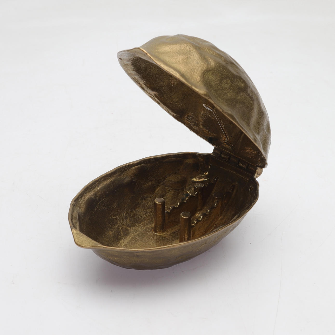 A walnut brass nutcracker, second half of the 20th century.