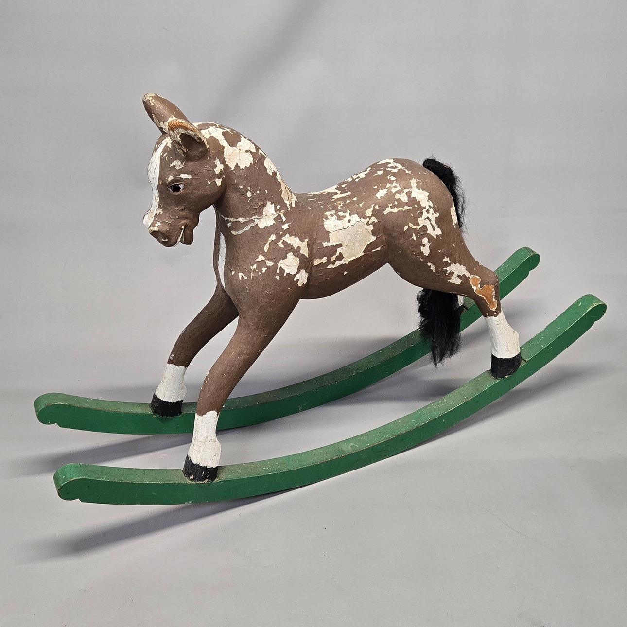 VINTAGE ROCKING HORSE.