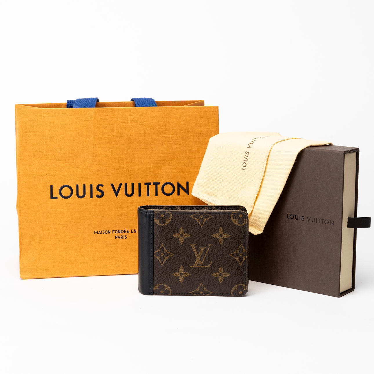 LOUIS VUITTON. Wallet, “Multiple Wallet Monogram Macassar Canvas”, 2015.