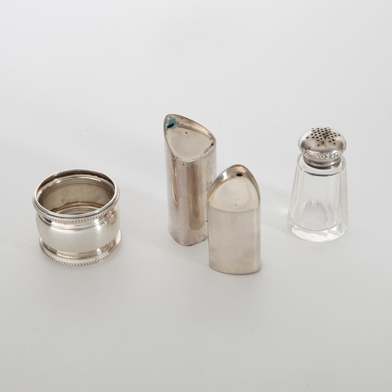SILVER OBJECTS, 4 pieces, fol. a salt and pepper jar by Tore Eldh.