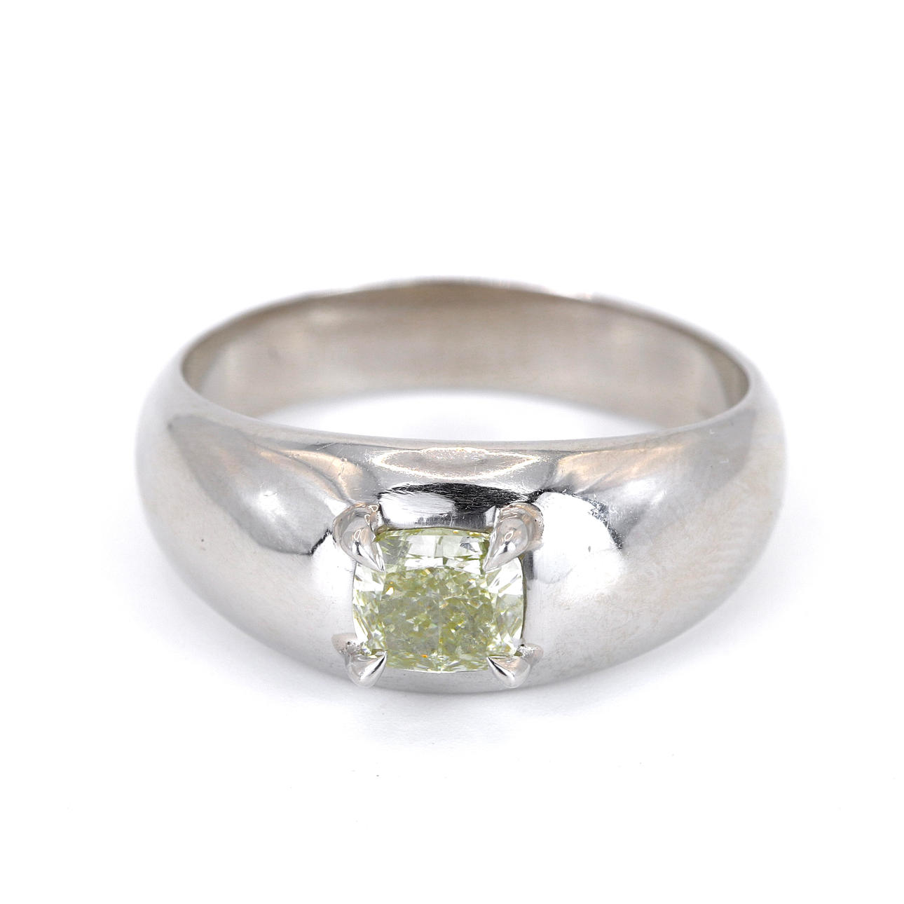 PLATINUM FANCY YELLOW DIAMOND SET RING.