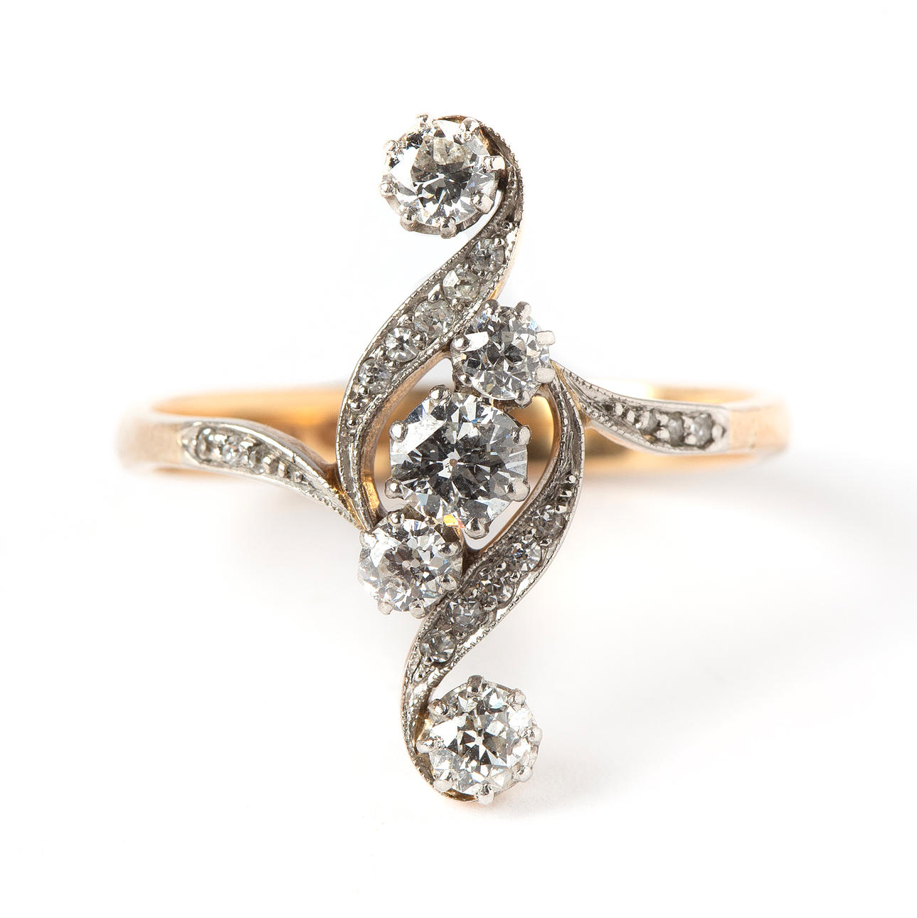 A 18K gold ring with old cut diamonds.