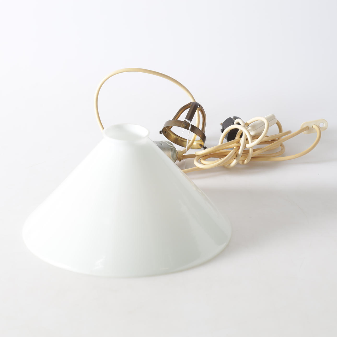 SKOMAKARLAMPA, 1900-talets första hälft.