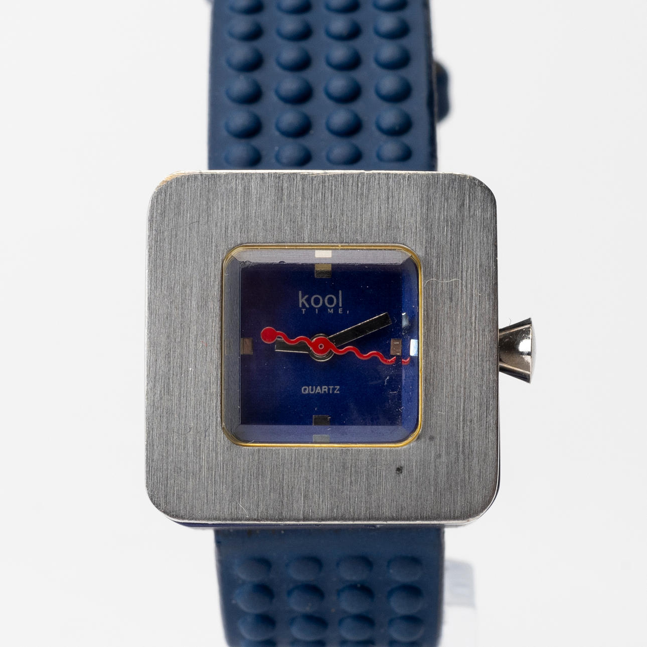 A metal and plastic quartz wristwatch, Kool Time, later part of the ...
