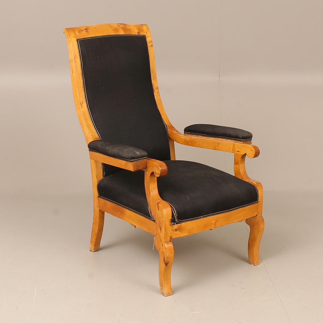 An armchair, birch, 19th century.