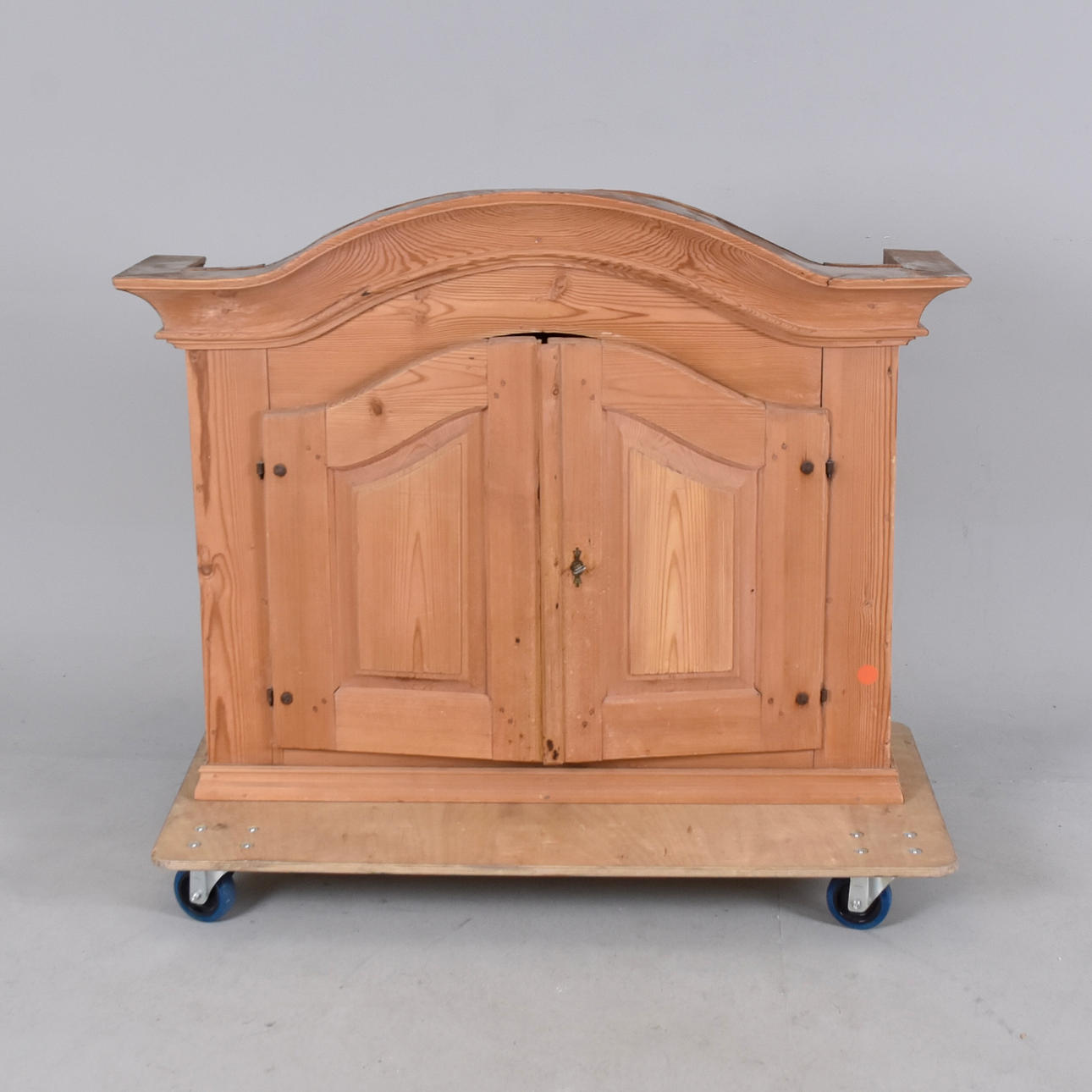 A 19th century pine wall cabinet.