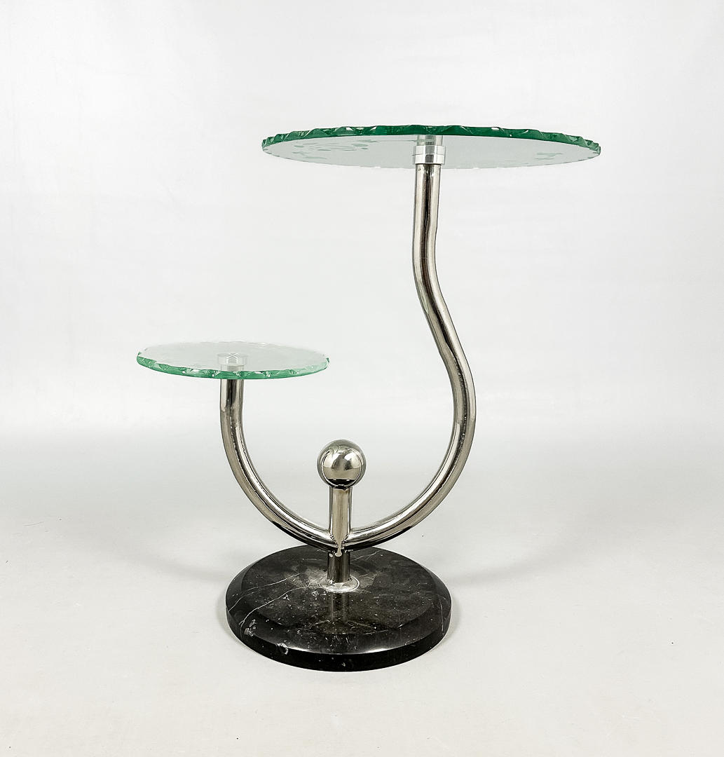 A mid-20th century Art Deco lamp table.