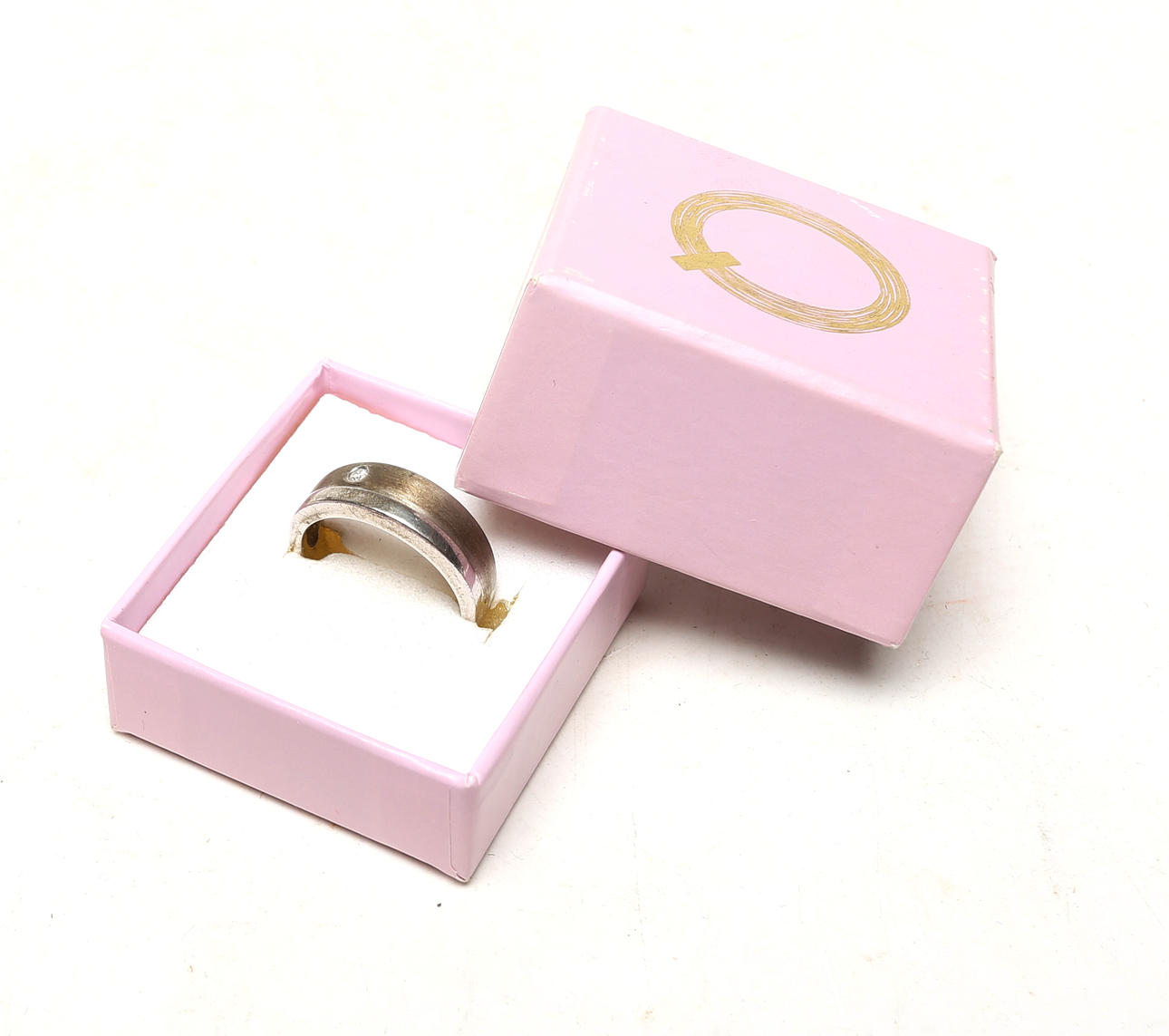 A STERLING SILVER RING.