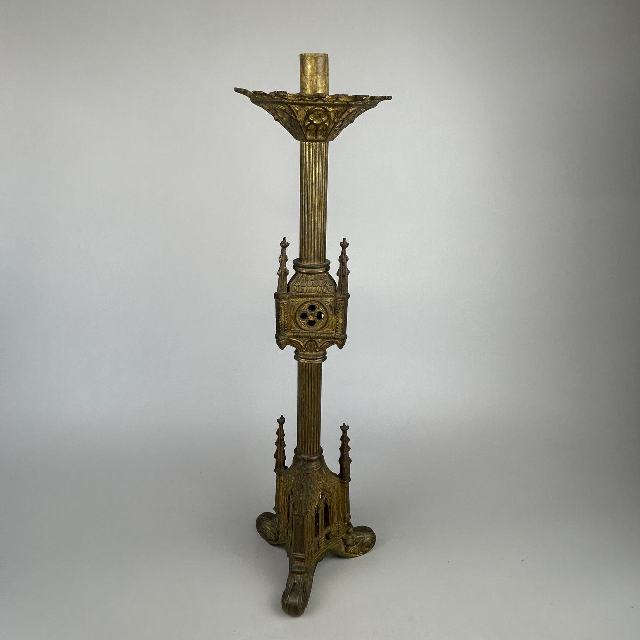 19TH CENTURY GOTHIC GILT BRASS CANDLESTICK.