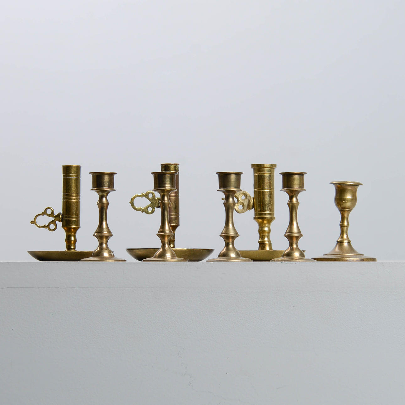 MINIATYRLJUSSTAKAR, 8 st, mässing.