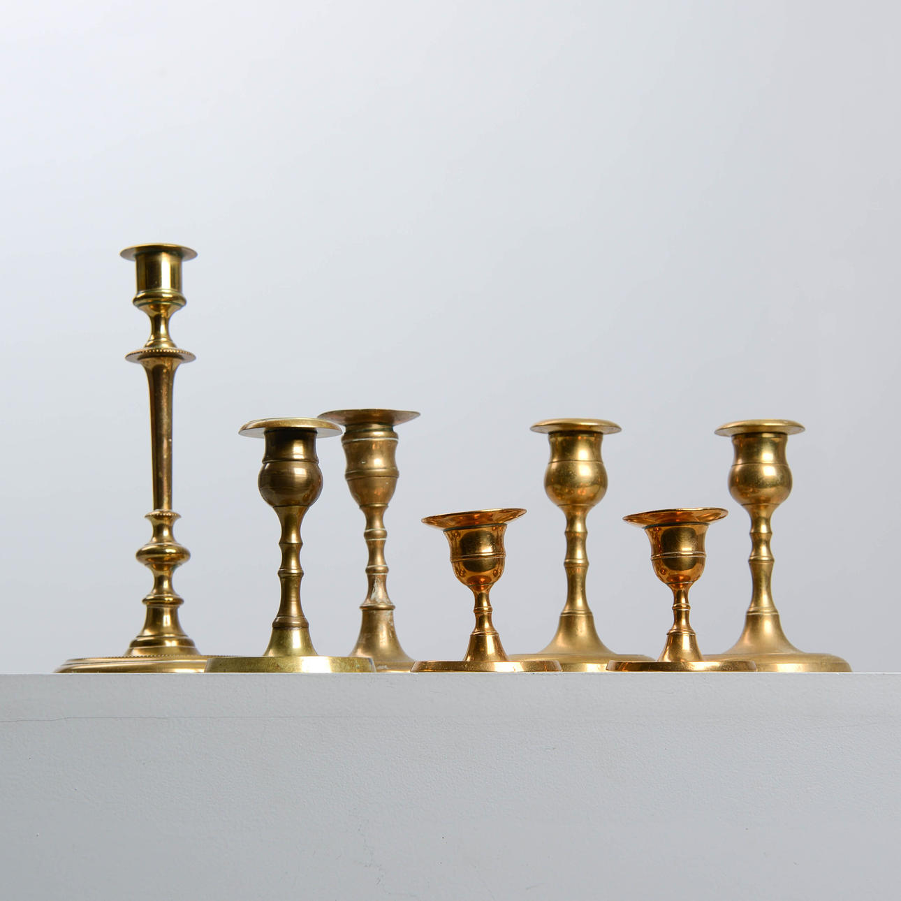 CANDLESTICKS, 7 pcs, brass.