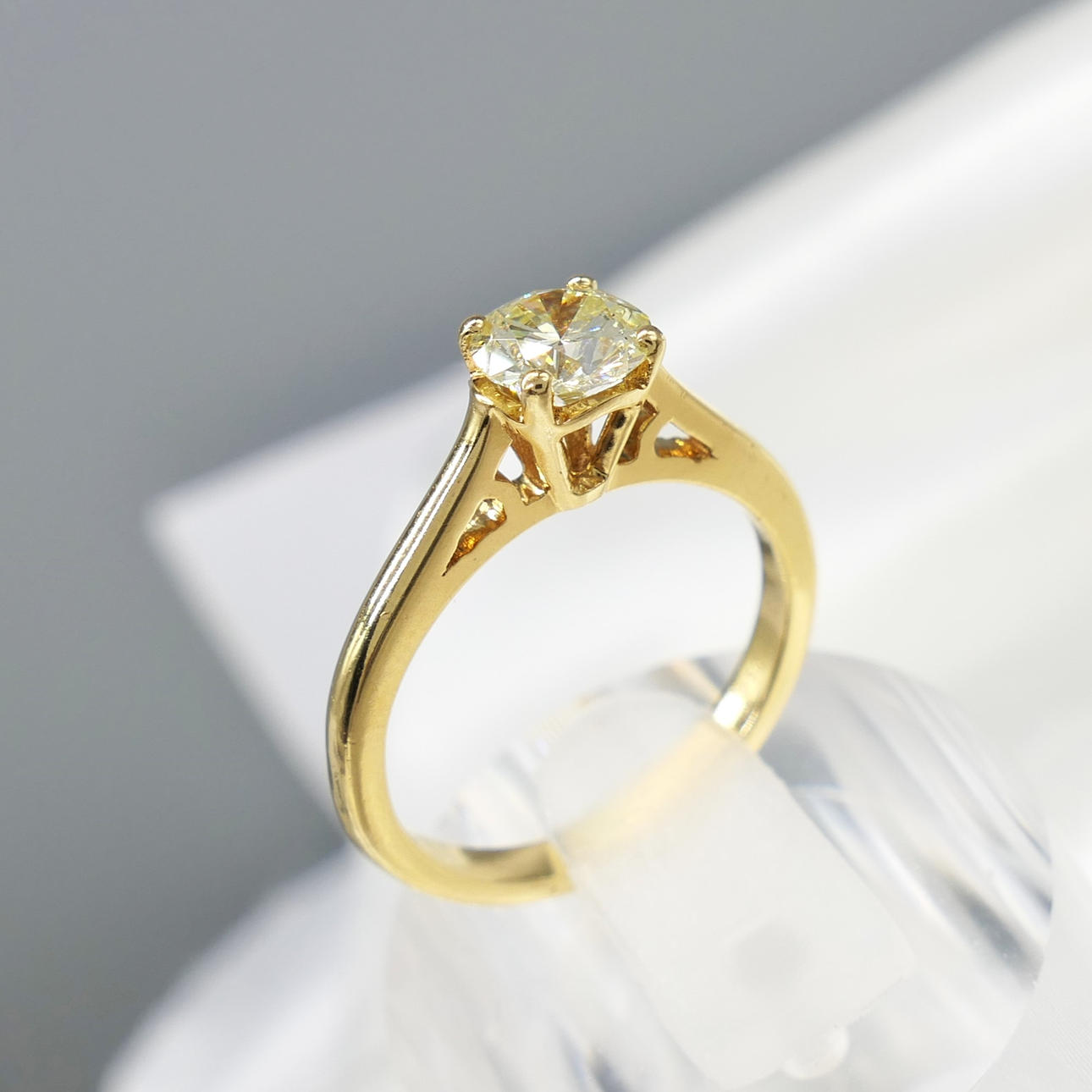 0.67 CARAT DIAMOND solitaire ring.