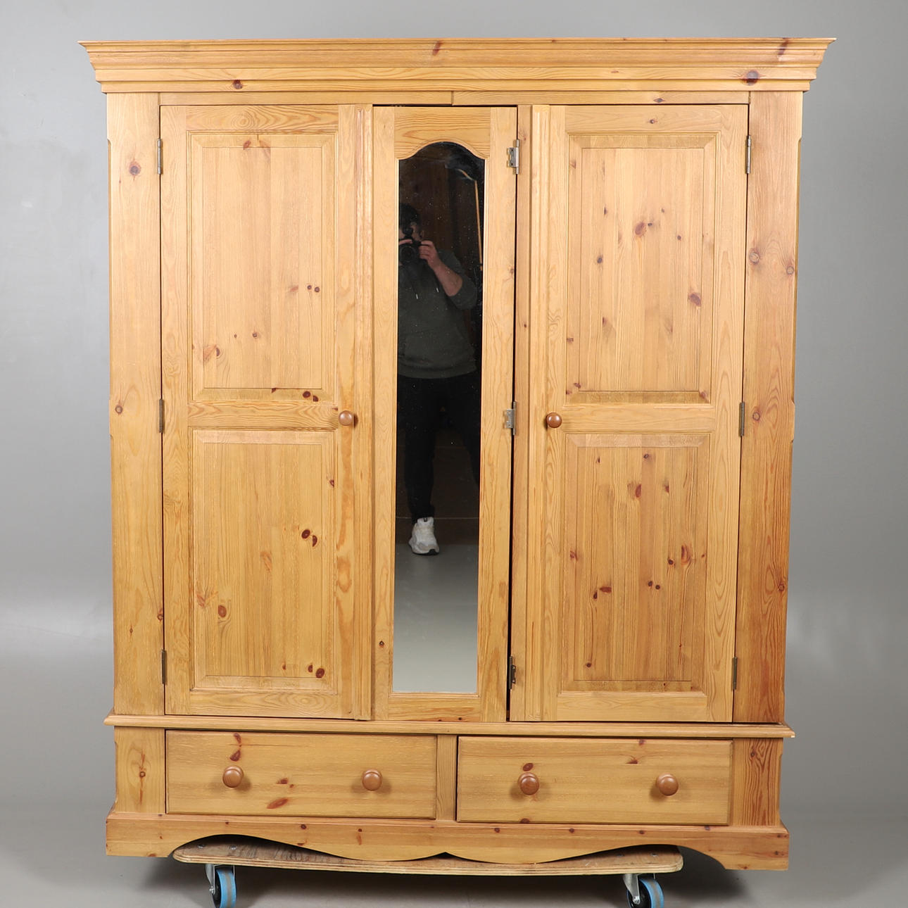 A MODERN PINE TRIPLE WARDROBE.