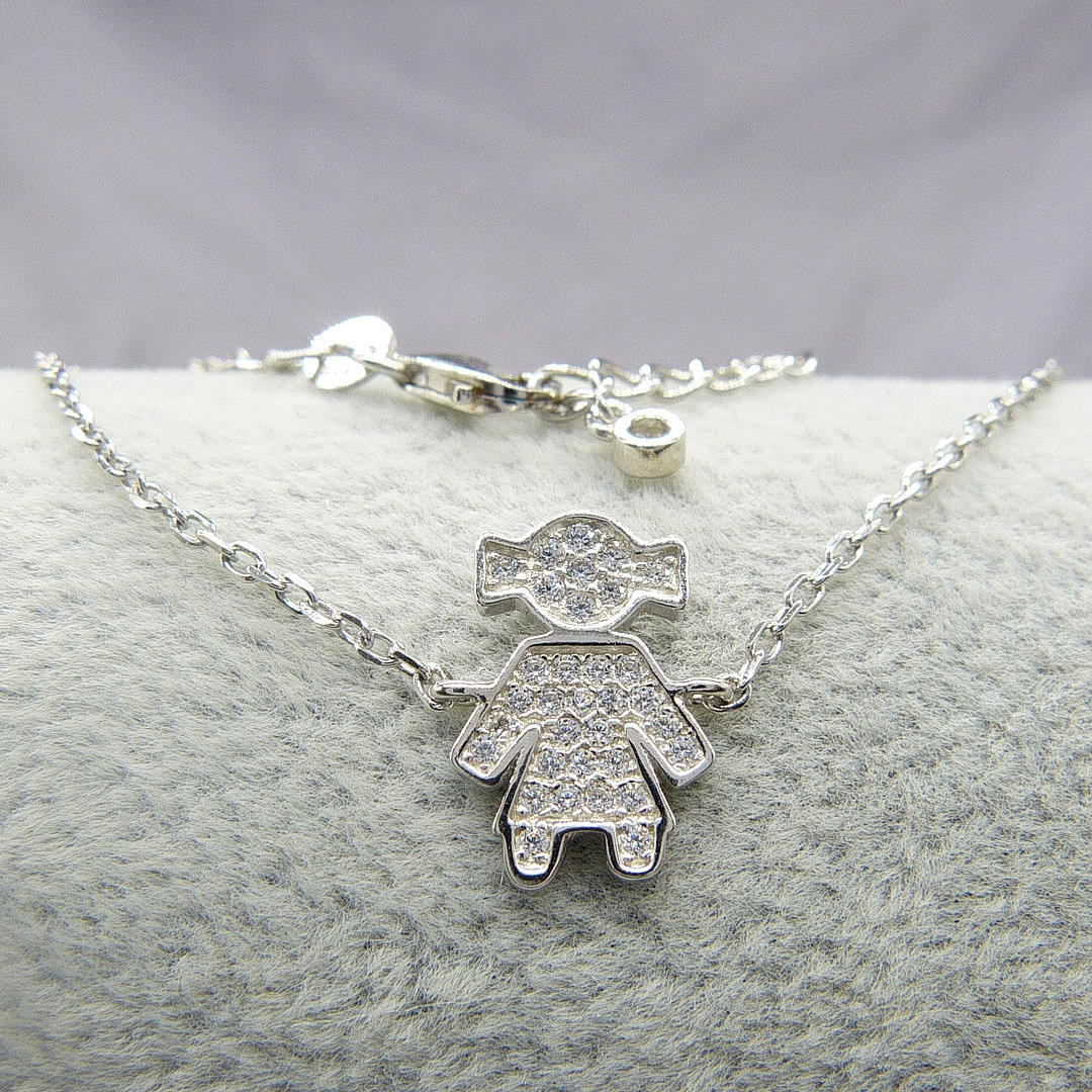 A SILVER "DOLLY" BRACELET.