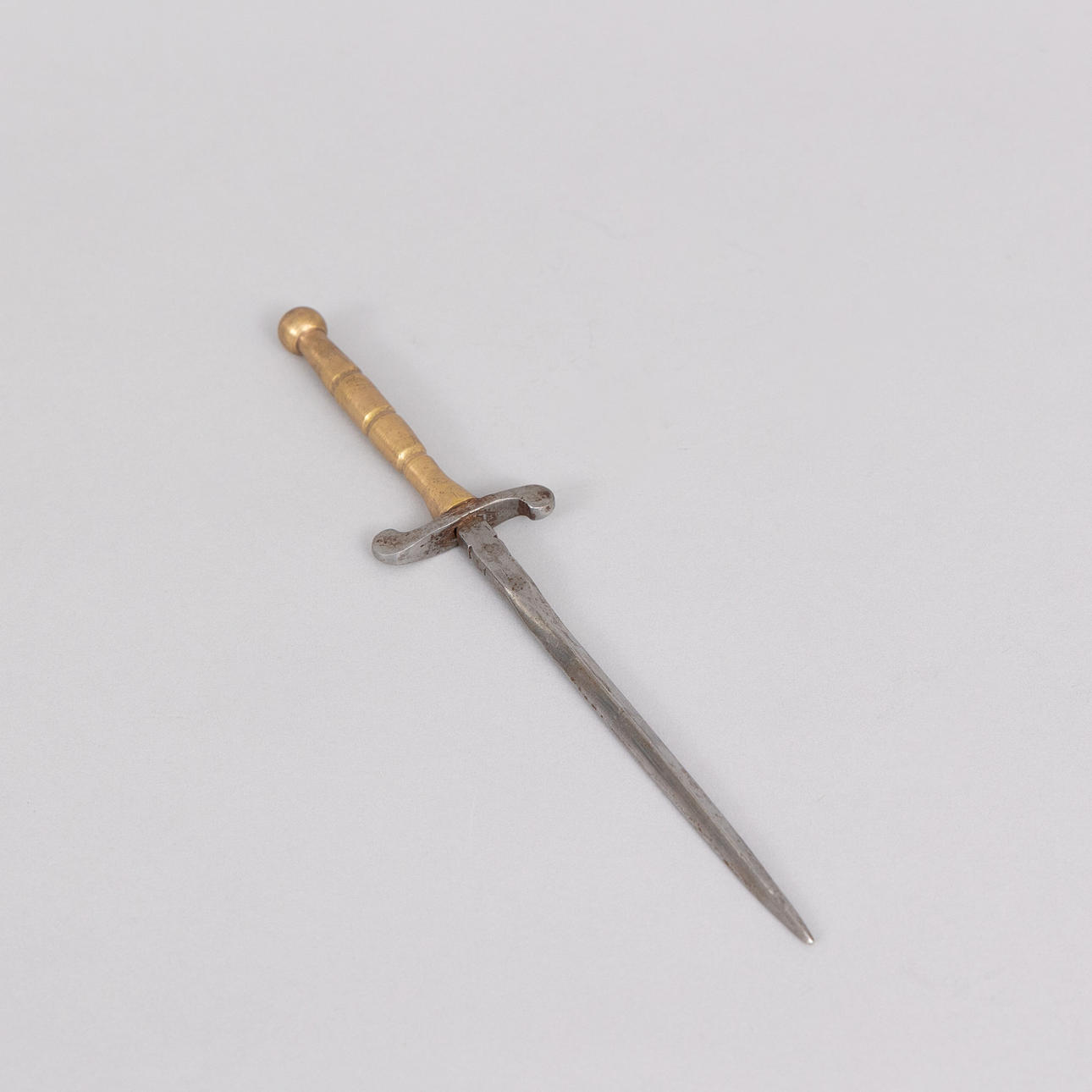 A dagger, brass handle, 19th century.