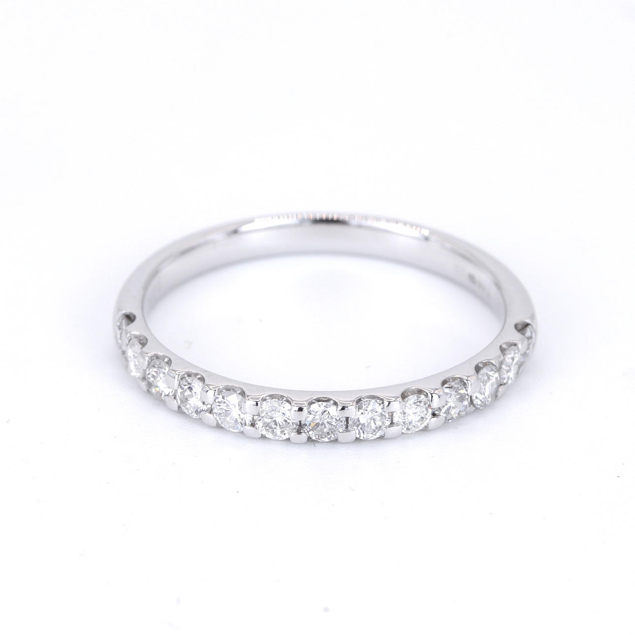 9CT WHITE GOLD HALF ETERNITY DIAMOND RING.