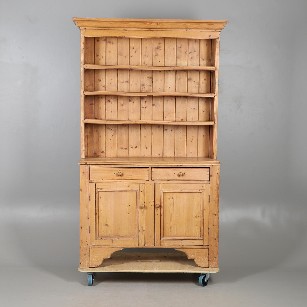 A RECLAIMED PINE KITCHEN DRESSER.