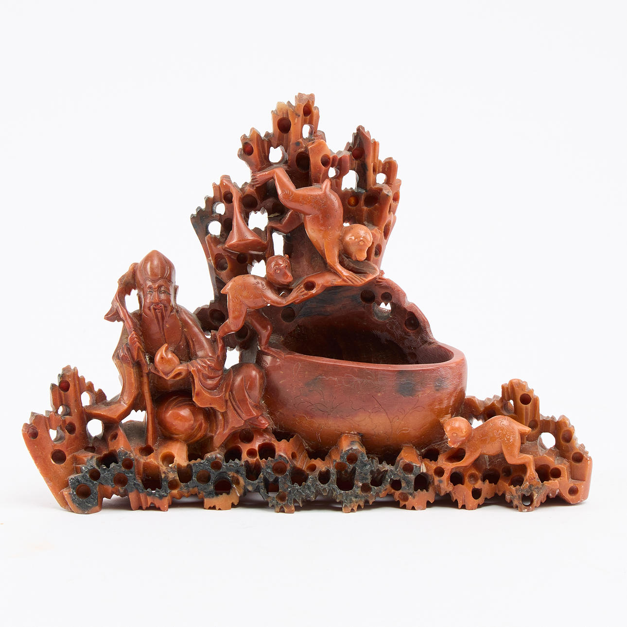 A Chinese carved stone sculpture.