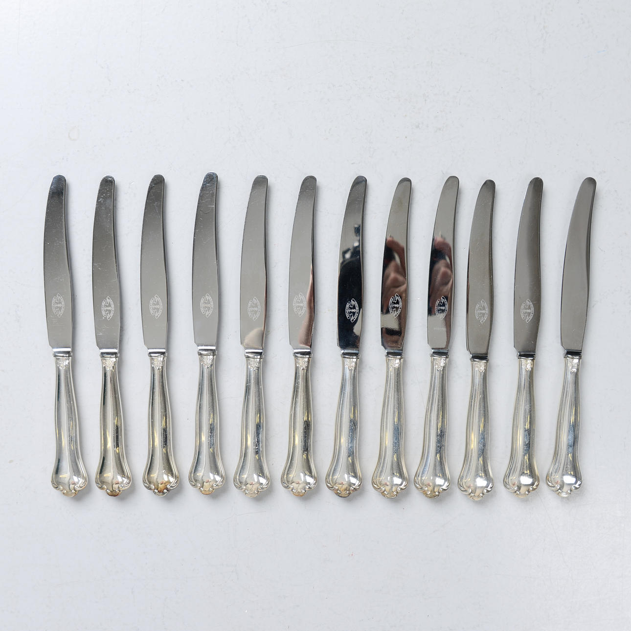 12 cheese knives, silver, Hallberg, 1952.