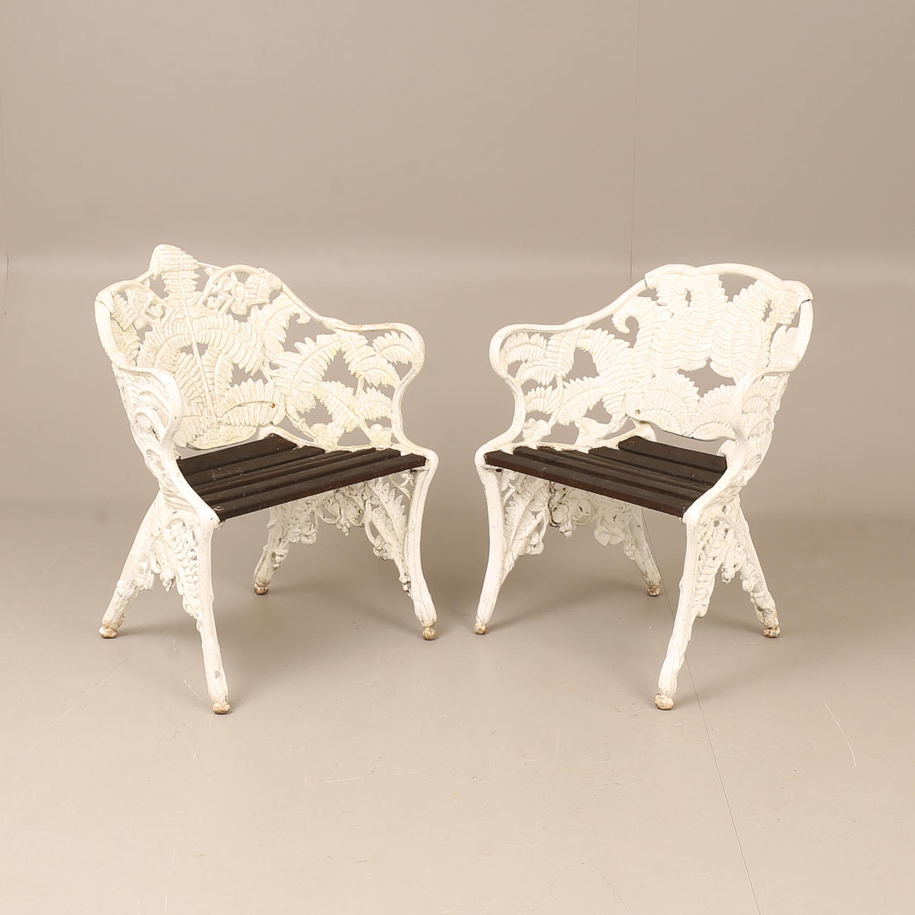 TRÄDGÅRDSFÅTÖLJER, 2 stycken, gjutjärn, ormbunksmodell, Riab och Melins.