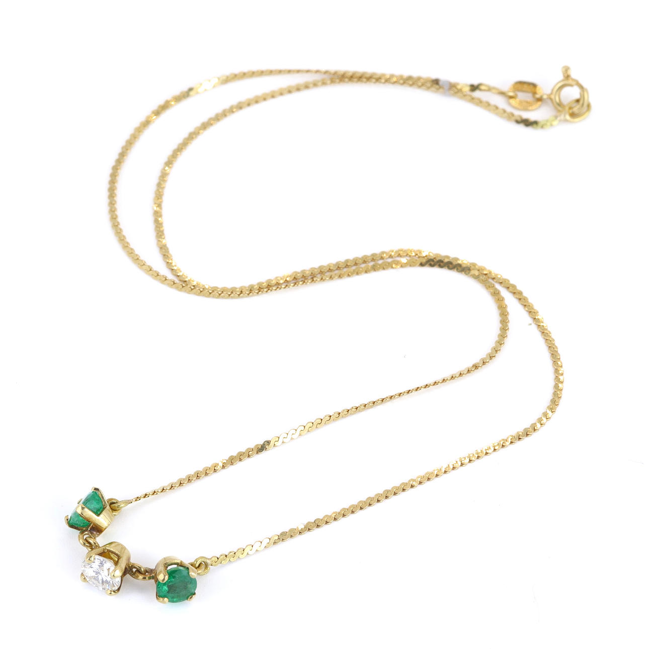 18CT GOLD EMERALD & DIAMOND SET NECKLACE.