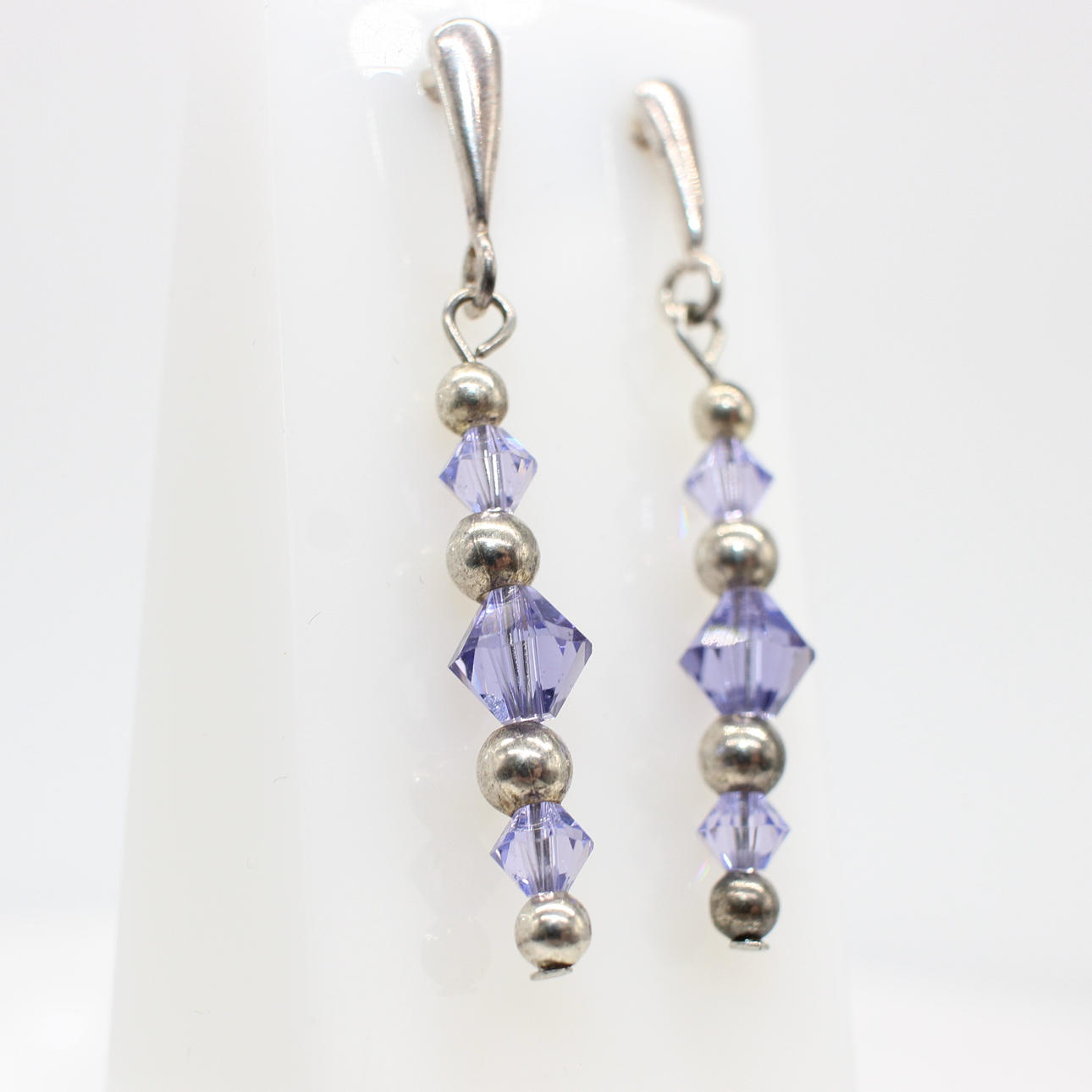 SILVER (925) EARRINGS WITH PURPLE STONES.