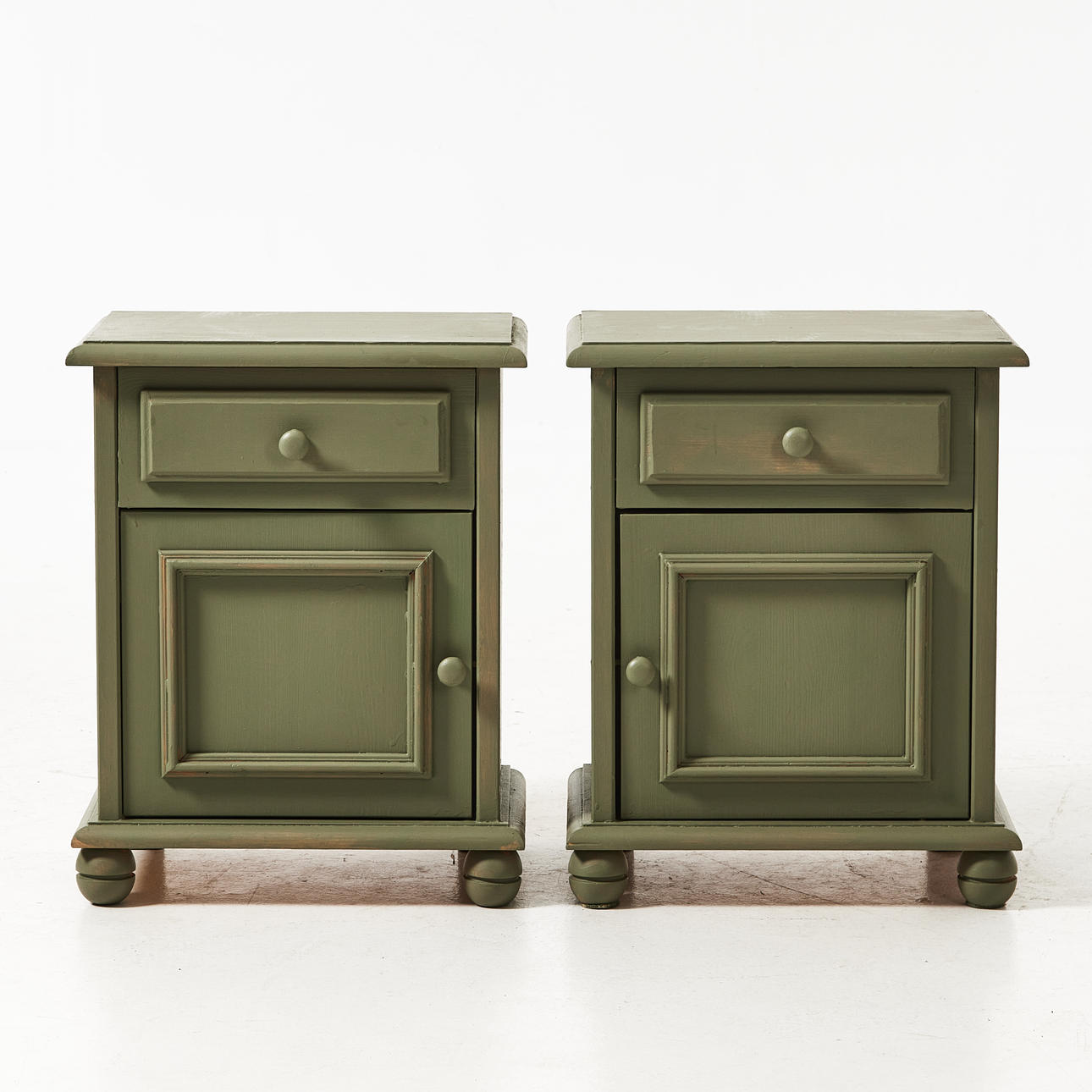 A pair of 1970's bedside tables.