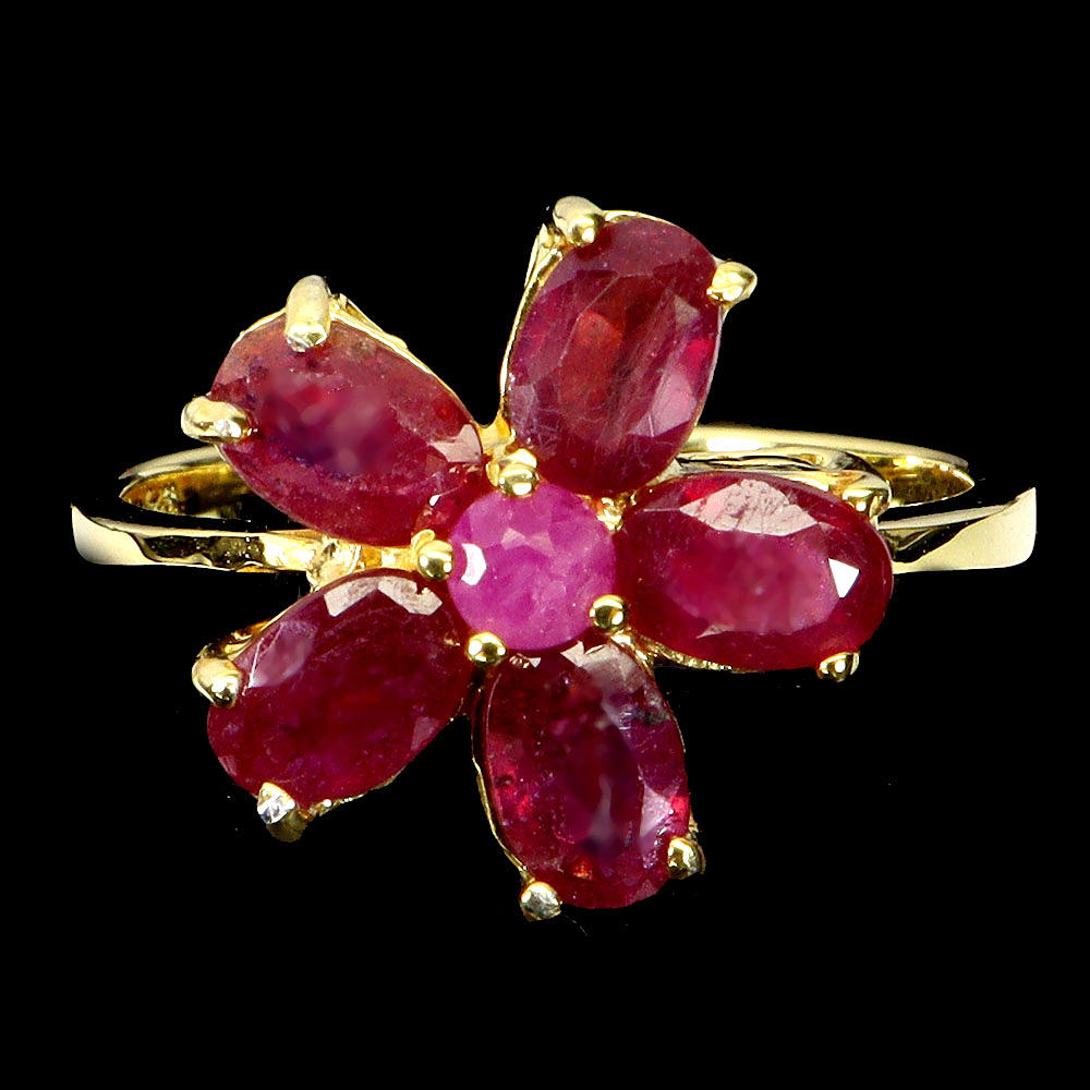 RUBY FLOWER SHAPED SILVER RING.