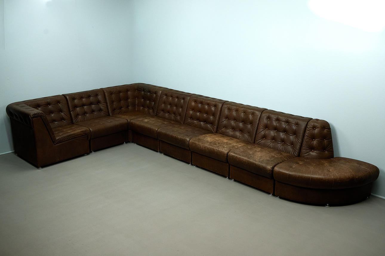 LAAUSER. probably, eight-piece modular sofa/ couch, leather, 1970s (8).