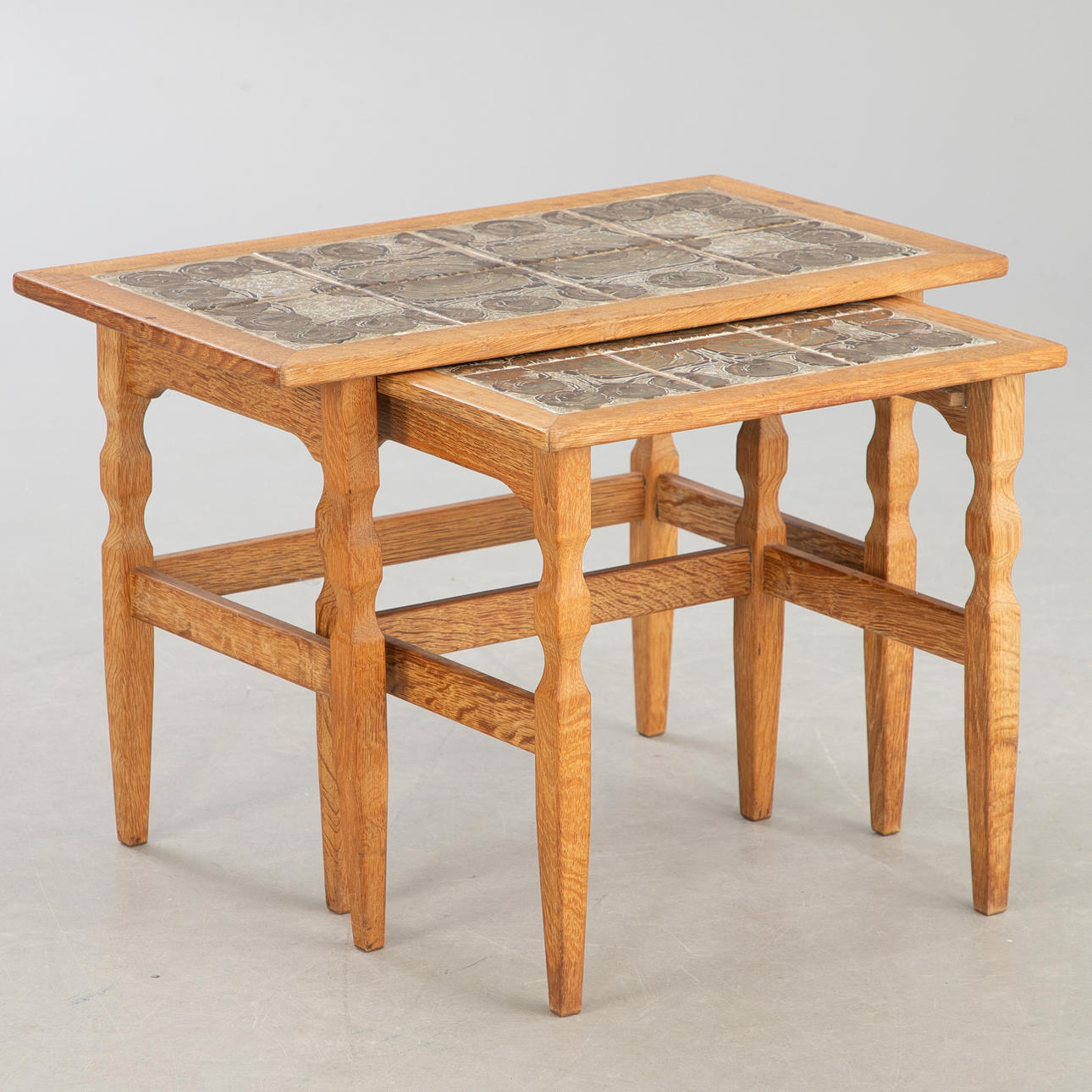 Henning Kjærnulf, side tables with tiles (2).