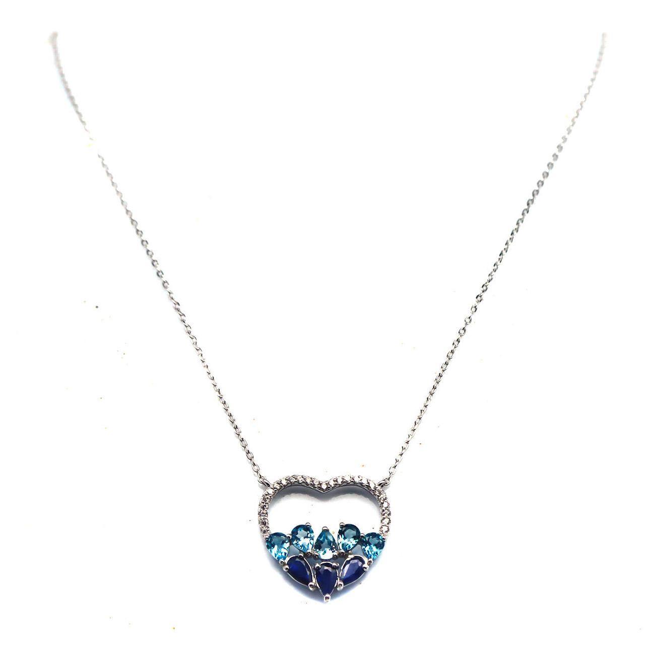 SAPPHIRE AND BLUE TOPAZ SILVER PENDANT.