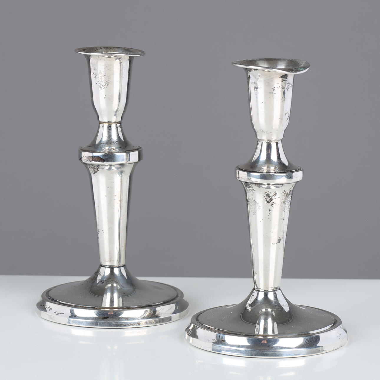 Pair of silver candlesticks, filled. Denmark (2).