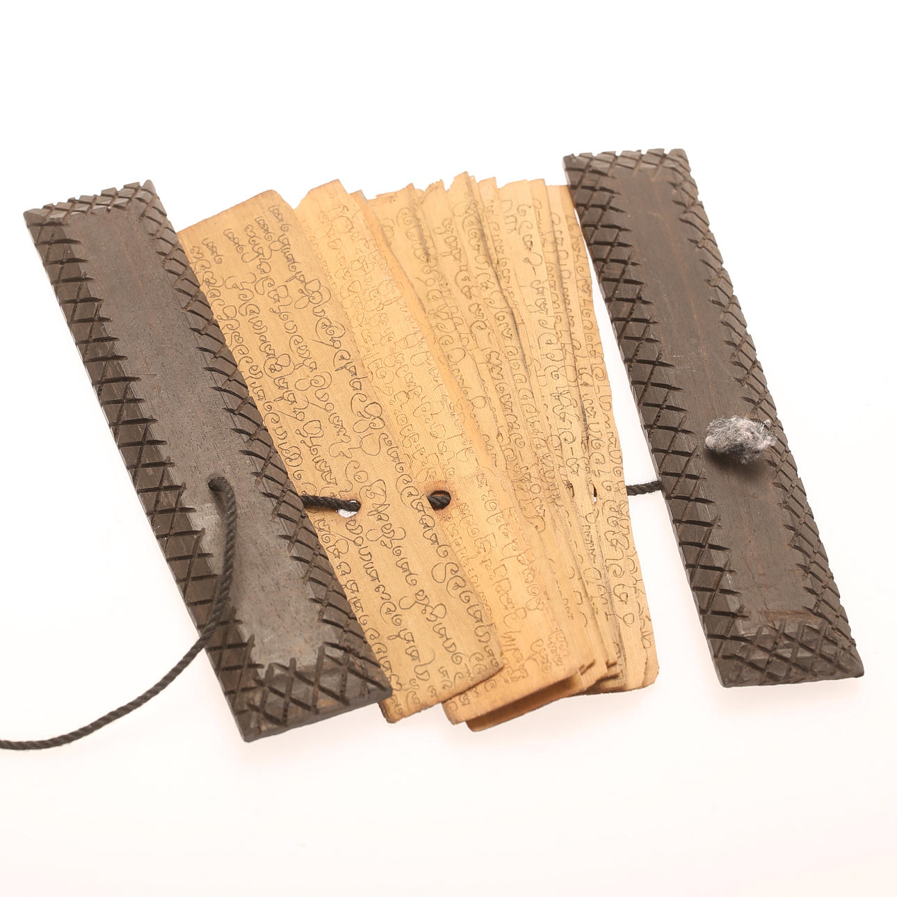 MANUSCRIPT, palm leaves bound, probably Sri Lanka.