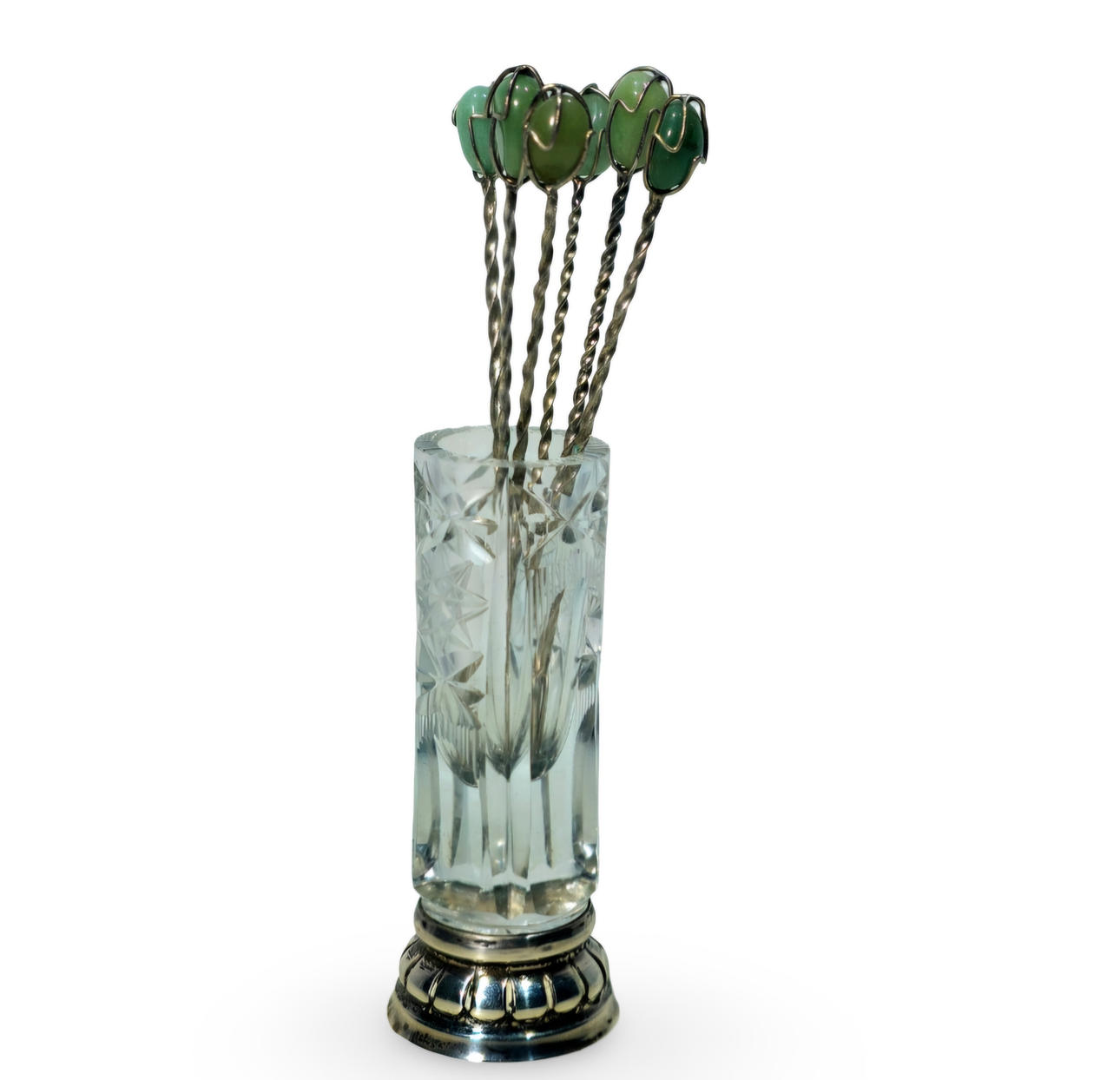 Toothpick in carved glass and silver base.