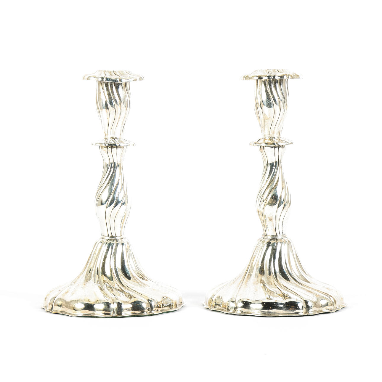 A pair of candlesticks, nickel silver.