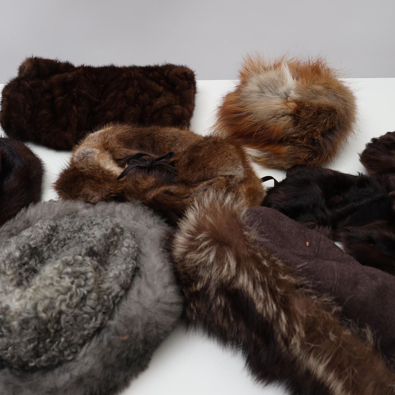 FUR HATS 6PCS, AND SLEEVE.