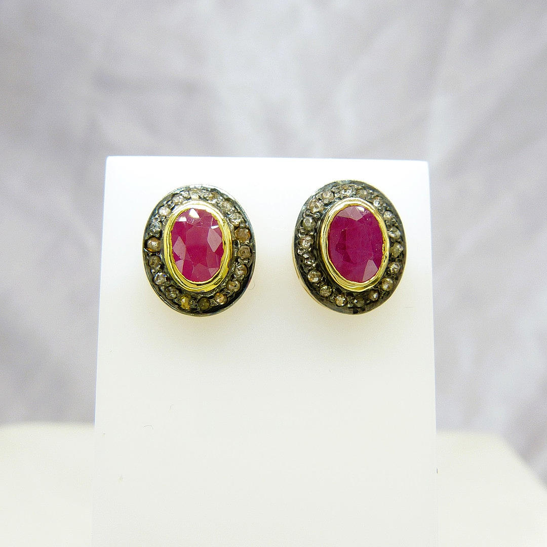 RUBY & DIAMOND EAR STUDS.