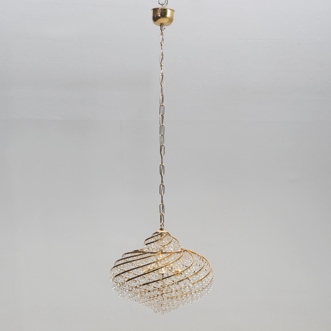 A 20th century metal ceiling lamp with prisms.