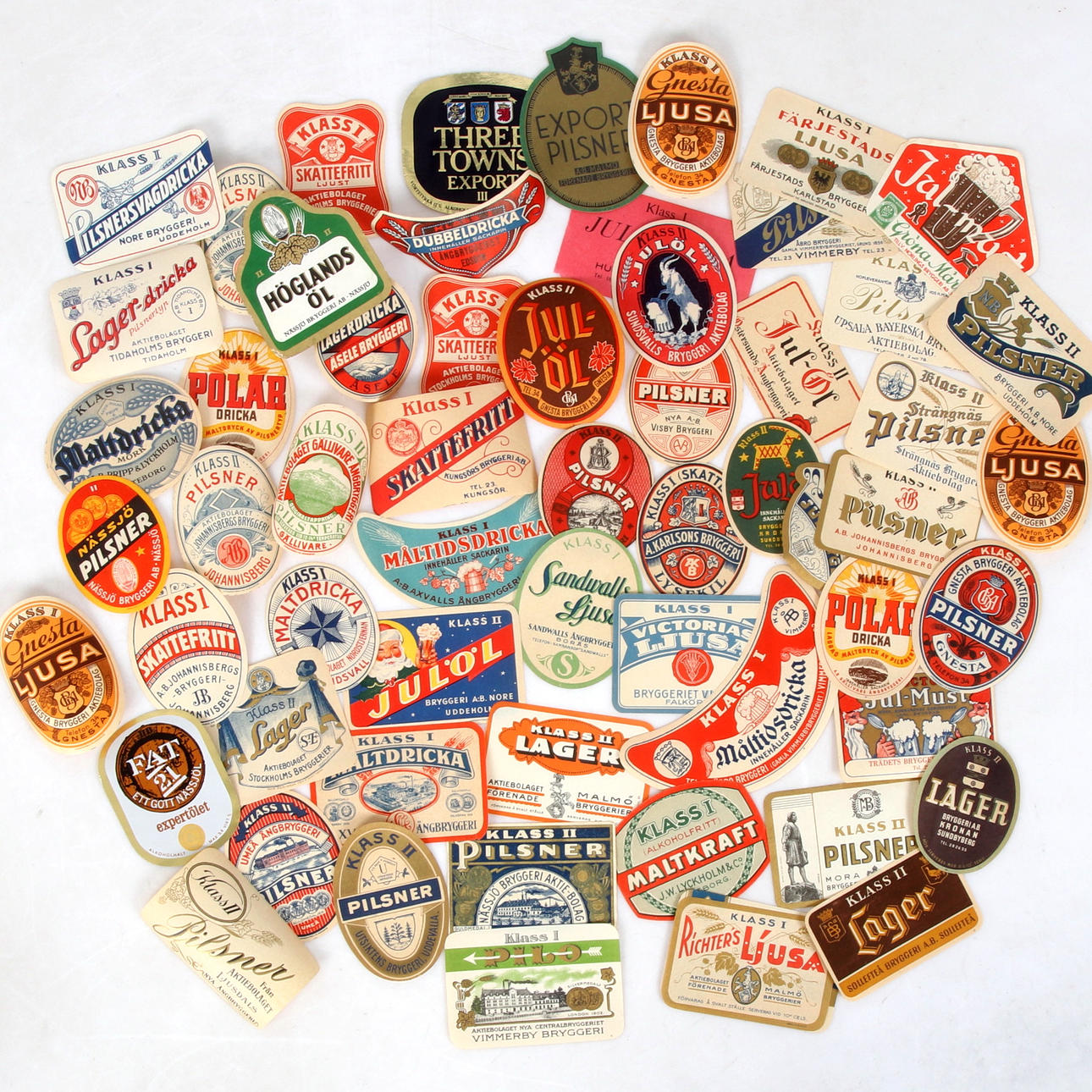 A collection of beer labels, most from the first half of the 20th ...