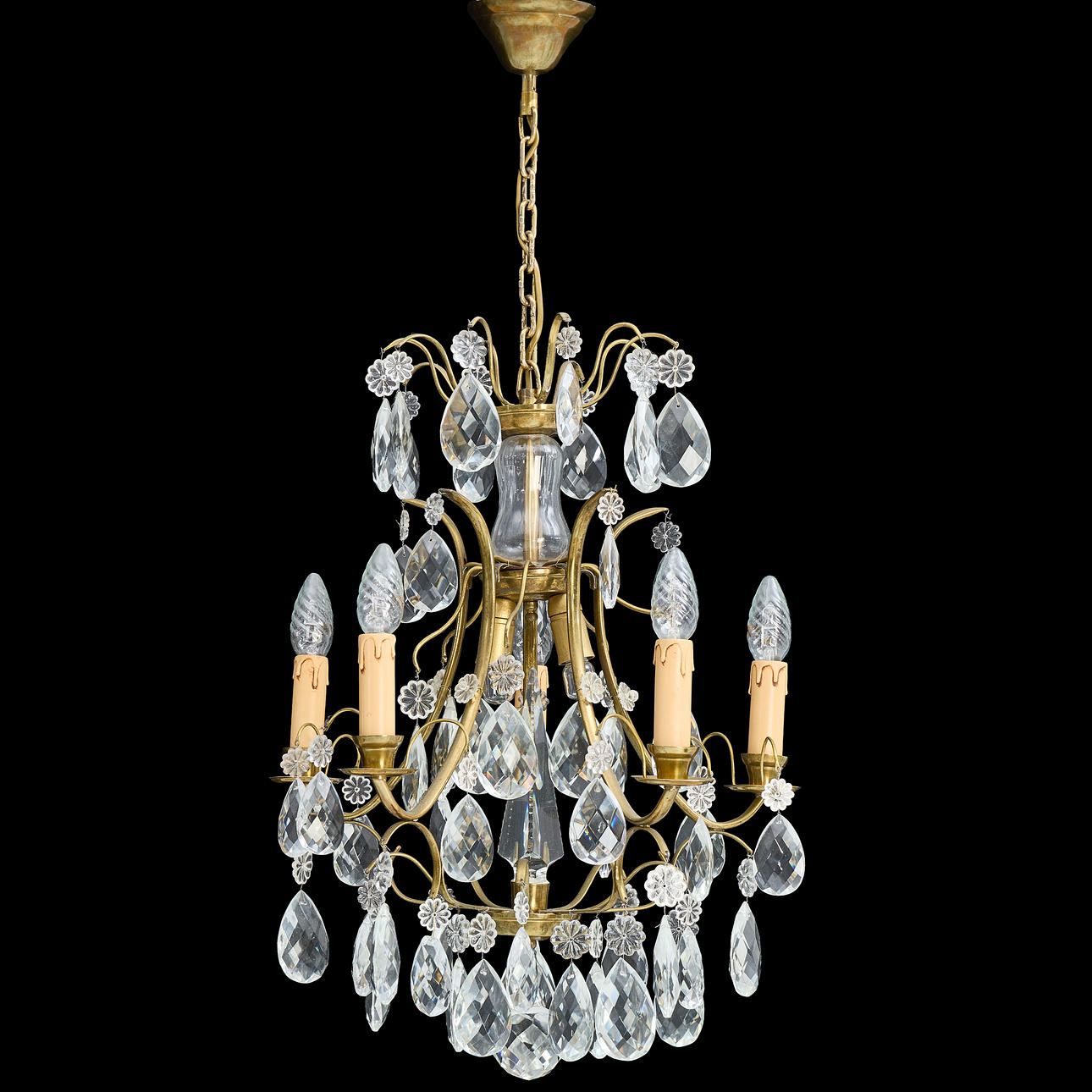 A rococo style five-point chandelier, 20th century.