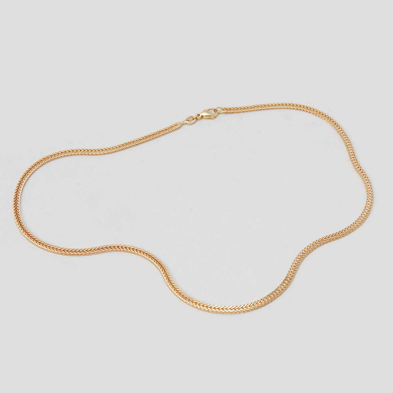 COLLIER, 18k guld. Vikt ca 13,4 g.
