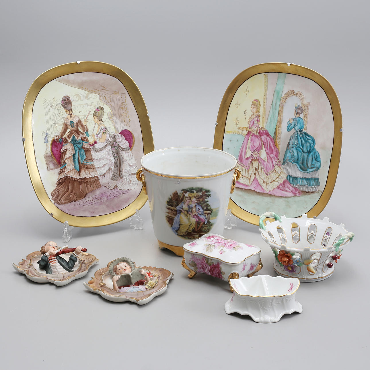 A rococo style porcelain, 8 pieces, partly Germany.