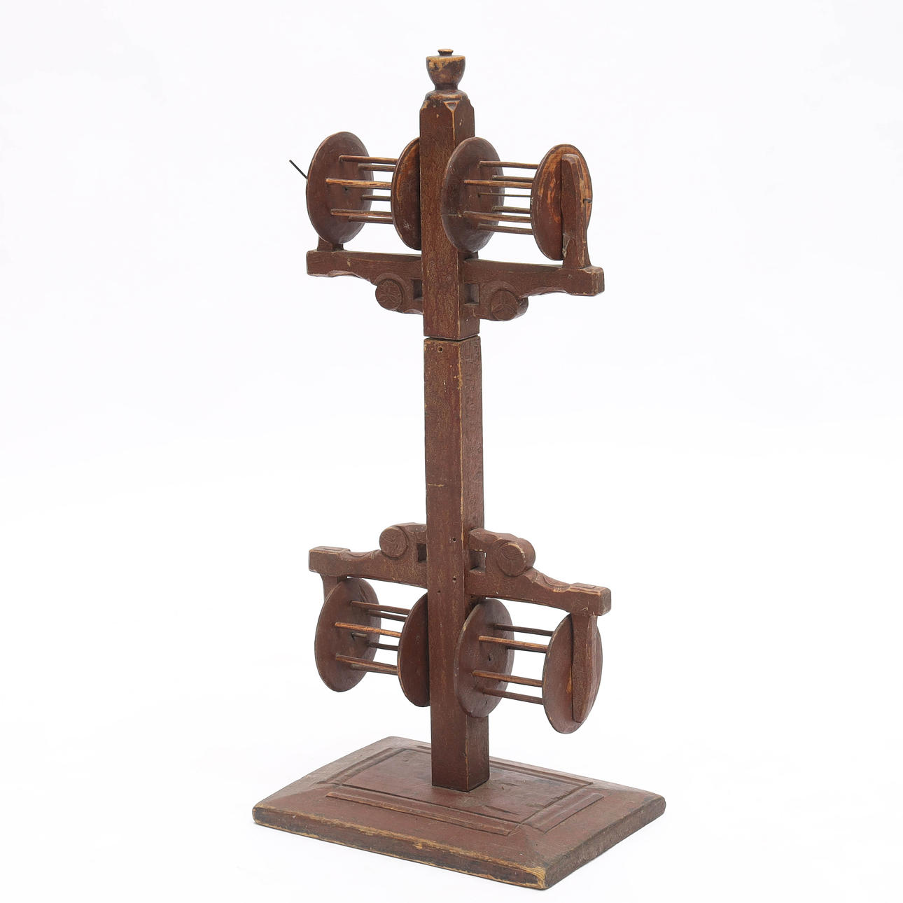 A 19th century painted yarn winder.