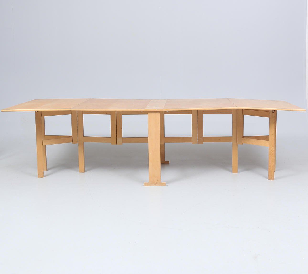 A 20th century birch percussion table.