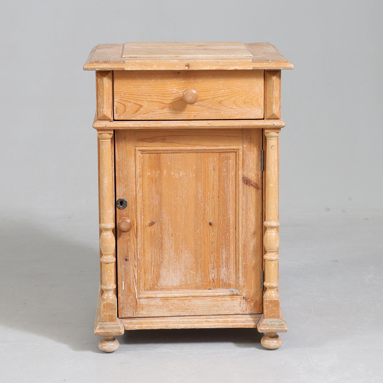 A 19th century pine pot cabinet.