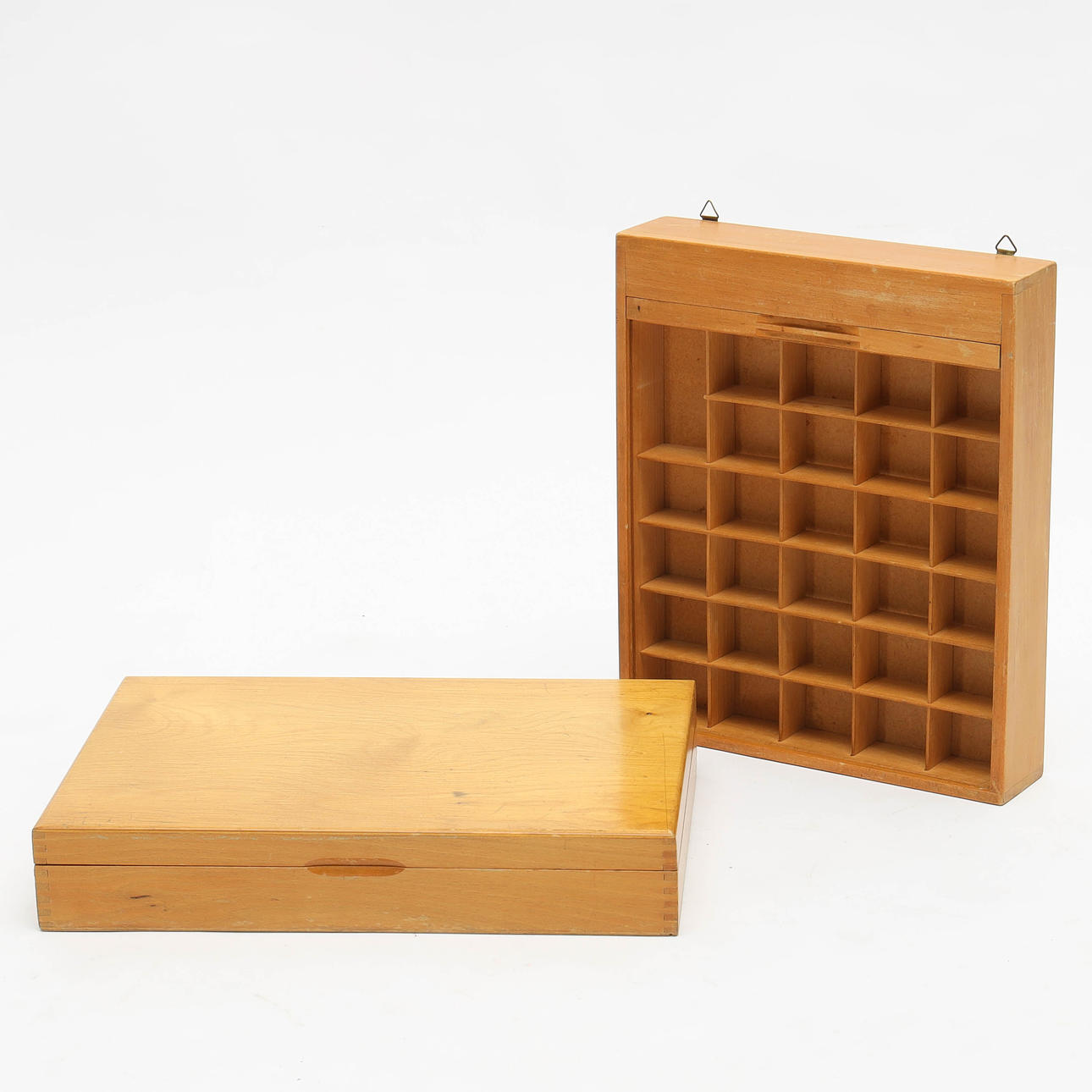 Two piece storage boxes for yarn Wolf Handarbeitsgarne, with blinds for objects, mid 20th century.