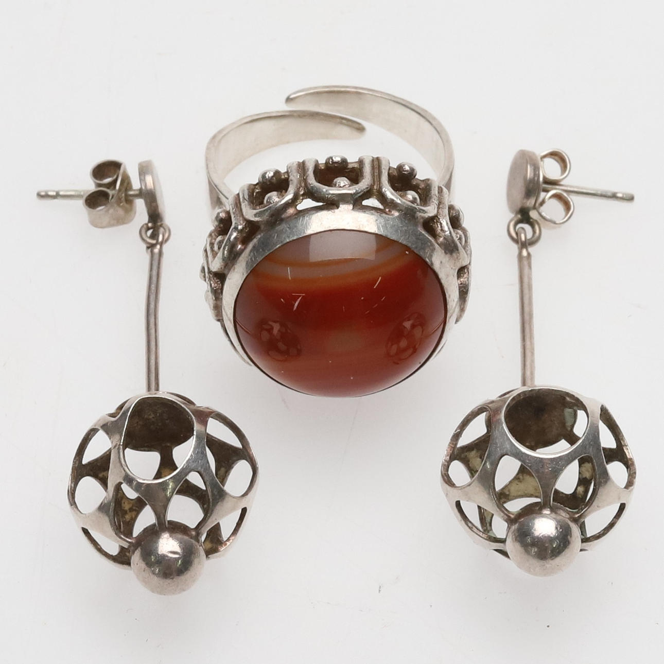 Ring & earrings, silver & red/brown stone.