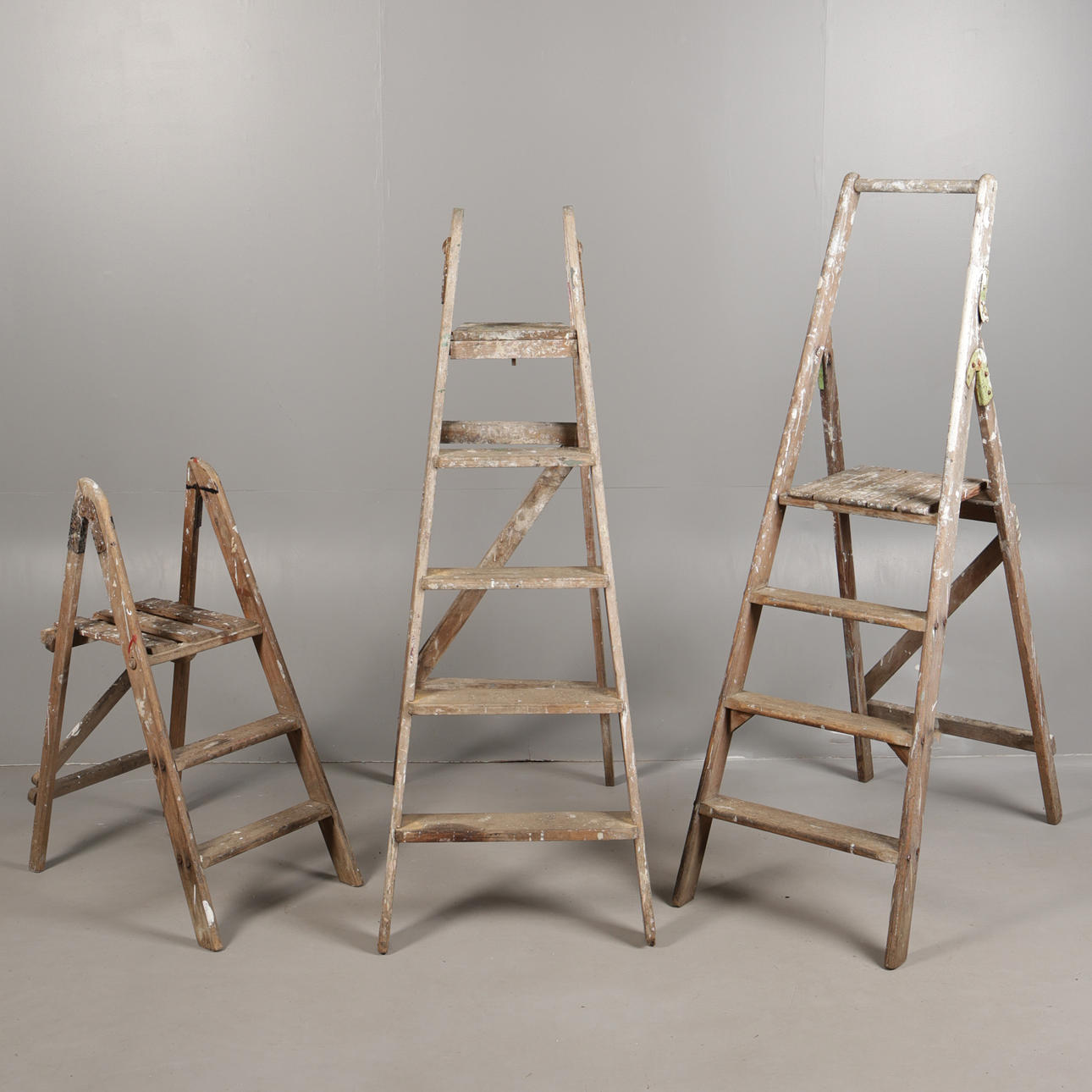 THREE FOLDING WOODEN STEP LADDERS (3).