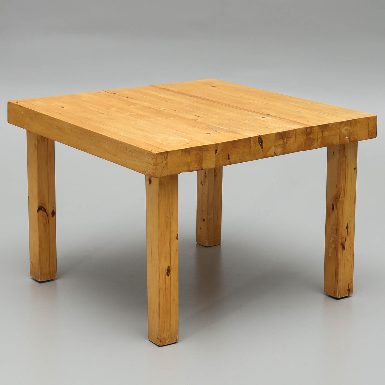 A 20th-century solid pine coffee table.